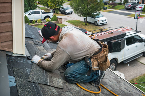Professional Emergency Roof Repair technician working in Tennyson, IN